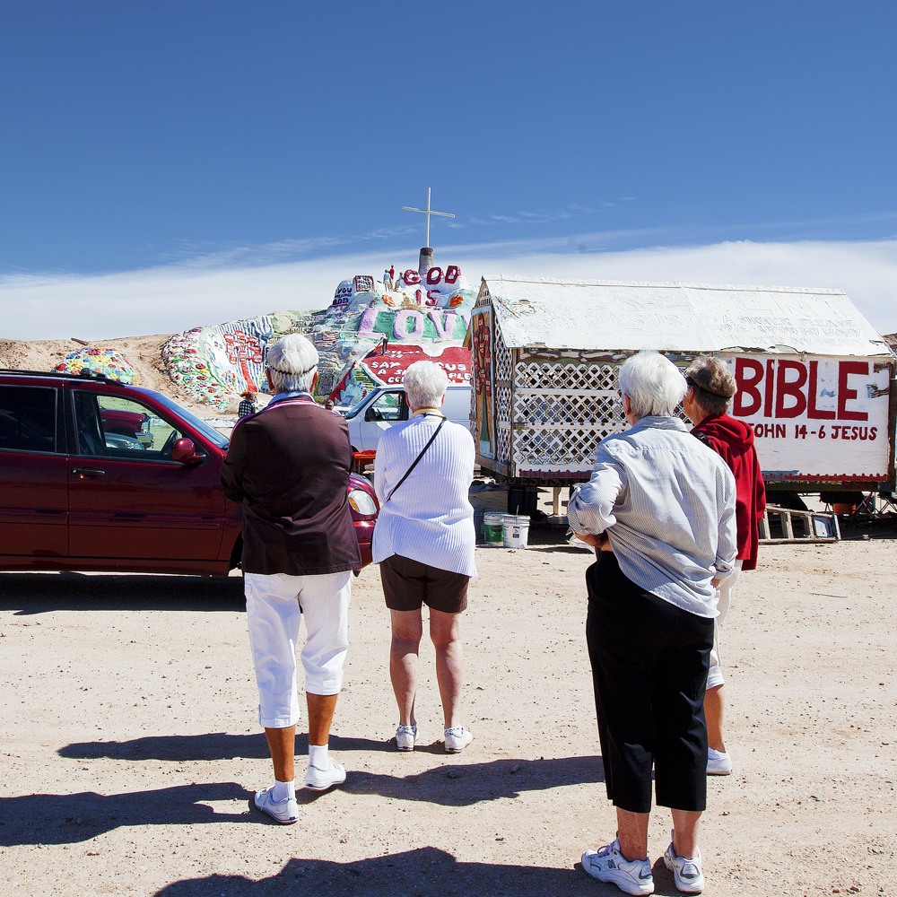 Tourists,Salvation Mountain, CA.